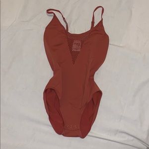 Form fitting bodysuit